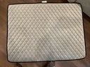 Top view - quilted surface, tag attached