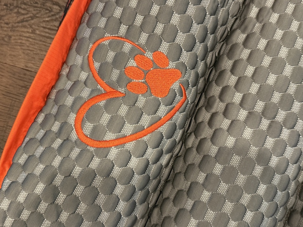 Orange paw logo on the cooling surface